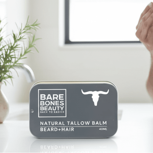 Man applying Beard Tallow Balm with high-res product label