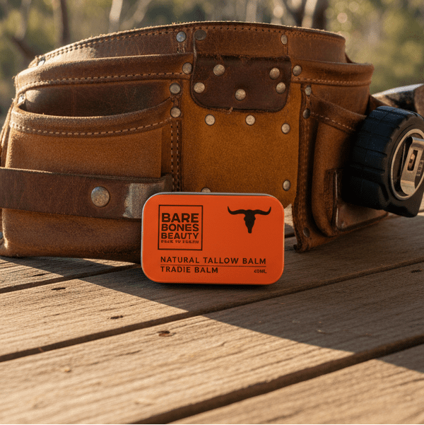 Tradie Tallow Balm leaning against Buckaroo toolbelt on porch