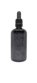 Black Seed Oil - 100ml in dark glass dropper bottle with detailed label highlighting digestive and health benefits