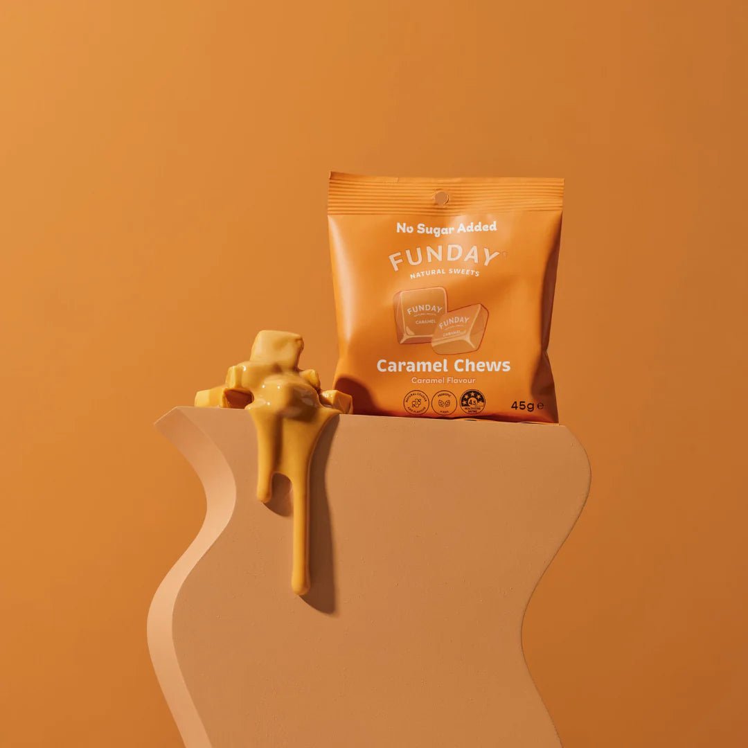 Funday Caramel Chews - 45g package with caramel pieces and caramel sauce dripping on a beige stand