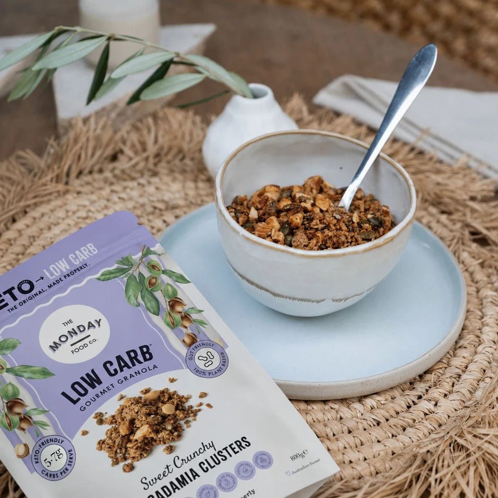 Bowl of The Monday Food Co Sweet Crunchy Macadamia Clusters granola beside the bag