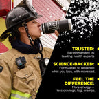 Firefighter in gear drinking from a black LMNT Lemonade Salt Electrolyte Mix - 30 Sticks container, highlighting hydration and electrolyte benefits by LMNT.