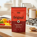 Organic Original Seasoning with Beef Liver - 75g by Prime Seasoning in a kitchen setting with fresh vegetables nearby.