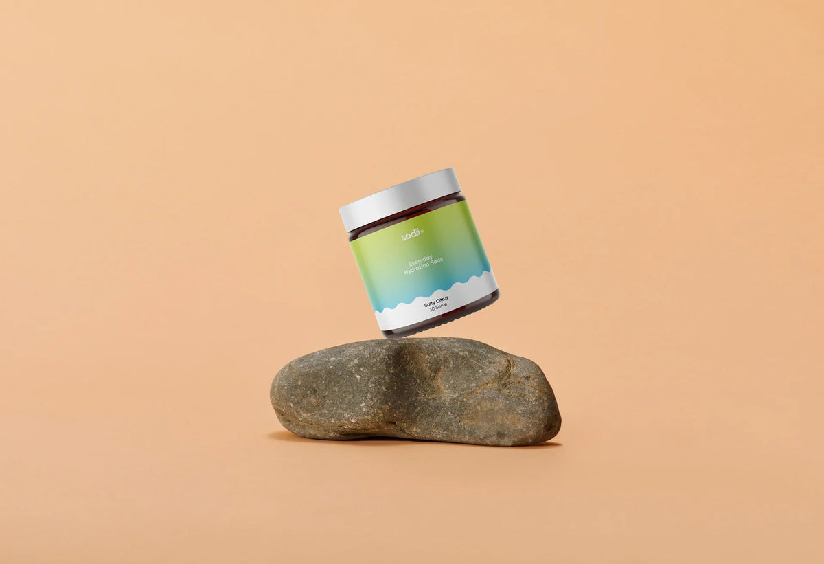 Salty Citrus - 30 Serve Tub by Sodii balanced on smooth stone, part of Drinks Electrolytes New Arrivals collections.