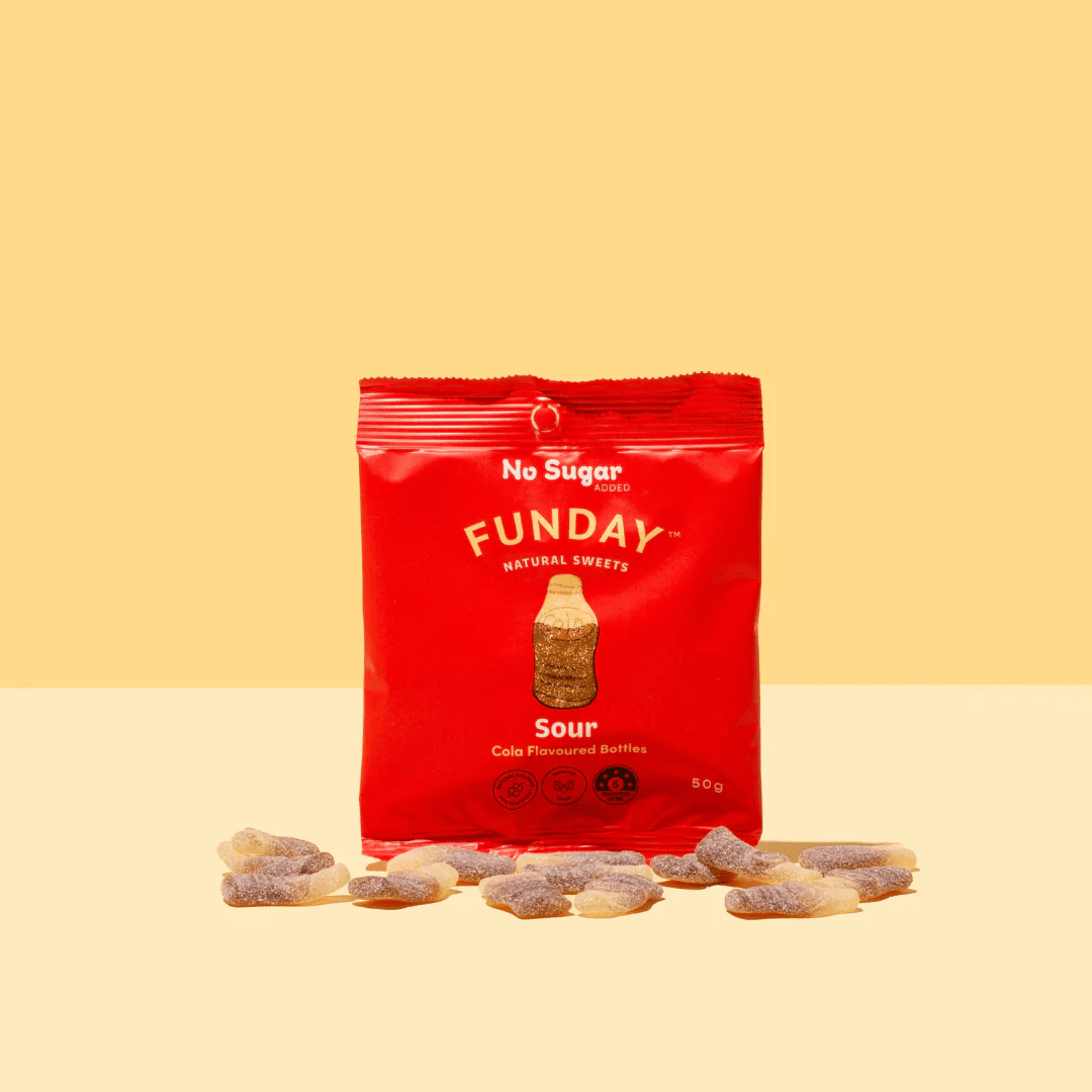 Sour Cola Bottles - 50g x 12 by Funday with no sugar cola-flavored gummies in red packaging on yellow background
