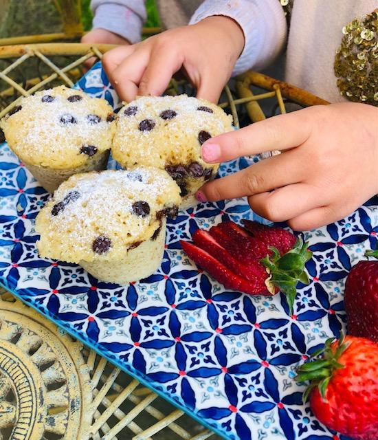 Blueberry muffins made with the English muffin mix on a patterned plate